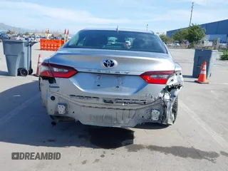 2021 Toyota Camry Hybrid LE with VIN 4T1C31AK5MU030969, listed as a IAAI auction lot 41862078 with 125,992 mi miles. Bid and sale history available at carsss.com. Image 17.
