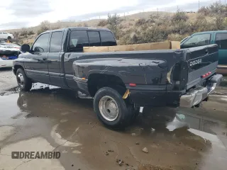 1999 Dodge Ram 3500 with VIN 1B7MC3361XJ624548, listed as a Copart auction lot 77225594 with 193,623 mi miles and Salvage Title. Bid and sale history available at carsss.com. Image 2.
