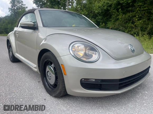 2013 Volkswagen Beetle 2.5L with VIN 3VW5X7AT2DM825928, listed as a Copart auction lot 66500855 with 48,795 mi miles and Salvage title. Bid and sale history available at DreamBid. Image 1.