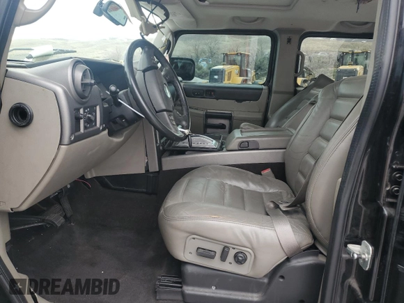 2004 Hummer H2 z VIN 5GRGN23U74H100175, wystawiony jako Copart lot #52642125 z przebiegiem 112 305 mil mil oraz Szkoda całkowita • Salvage title. Historia ofert i sprzedaży dostępna na DreamBid. Obrazek 7.