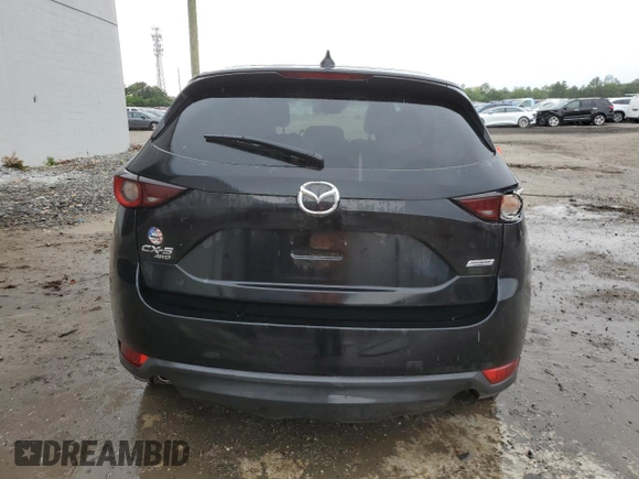 2018 Mazda CX-5 Touring z VIN JM3KFBCM4J0377280, wystawiony jako Copart lot #56688575 z przebiegiem 101 167 mil mil oraz Czysty tytuł • Clean title. Historia ofert i sprzedaży dostępna na DreamBid. Obrazek 6.