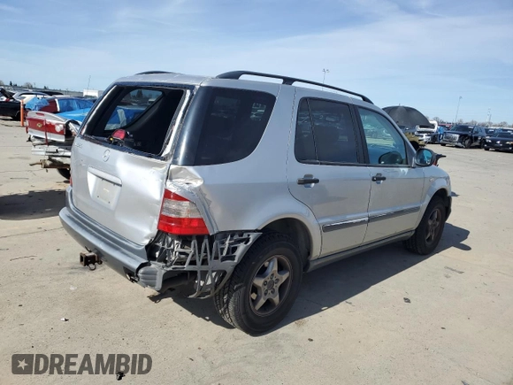 1998 Mercedes-Benz M-Class with VIN 4JGAB54E7WA041547, listed as a Copart auction lot 42334655 with 183,814 mi miles and Salvage Title. Bid and sale history available at carsss.com. Image 3.