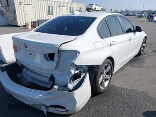 2014 BMW 3 Series 328i with VIN WBA3A5C52EJ463819, listed as a IAAI auction lot 41669717 with 111,112 mi miles. Bid and sale history available at carsss.com. Image 4.