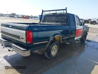 1995 Ford F-150 with VIN 1FTEX15N4SKC22219, listed as a IAAI auction lot 41704904 with 267,405 mi miles. Bid and sale history available at carsss.com. Image 4.