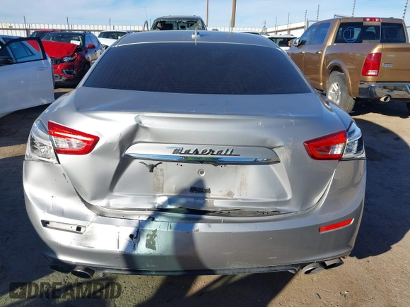 2015 Maserati Ghibli z VIN ZAM57XSA7F1135961, wystawiony jako IAAI lot #40831583 z przebiegiem 89 671 mil mil oraz . Historia ofert i sprzedaży dostępna na DreamBid. Obrazek 16.