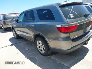 2013 Dodge Durango SXT z VIN 1C4RDHAG4DC512046, wystawiony jako IAAI lot #42826019 z przebiegiem 192 308 mil mil oraz . Historia ofert i sprzedaży dostępna na DreamBid. Obrazek 3.
