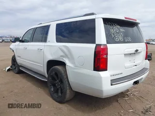 2015 Chevrolet Suburban LTZ with VIN 1GNSKKKC5FR691219, listed as a IAAI auction lot 41921973 with 169,119 mi miles and . Bid and sale history available at DreamBid. Image 14.