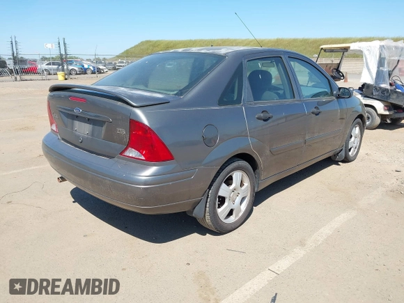 2003 Ford Focus ZTS with VIN 1FAFP38353W178144, listed as a IAAI auction lot 42039418 with 156,709 mi miles and . Bid and sale history available at carsss.com. Image 4.