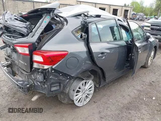 2018 Subaru Impreza Premium z VIN 4S3GTAD67J3701533, wystawiony jako IAAI lot #42157704 z przebiegiem 63 999 mil mil oraz . Historia ofert i sprzedaży dostępna na DreamBid. Obrazek 4.