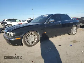 2005 Jaguar XJ VDP with VIN SAJWA82C75SG45094, listed as a Copart auction lot 83891564 with 57,467 mi miles and Salvage Title. Bid and sale history available at carsss.com. Image 1.