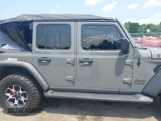 2021 Jeep Wrangler Unlimited Rubicon with VIN 1C4HJXFN3MW816375, listed as a IAAI auction lot 42480514 with 62,324 mi miles and . Bid and sale history available at DreamBid. Image 13.