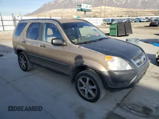 2002 Honda CR-V LX with VIN JHLRD68532C014509, listed as a Copart auction lot 86043944 with 202,988 mi miles and Salvage Title. Bid and sale history available at DreamBid. Image 4.