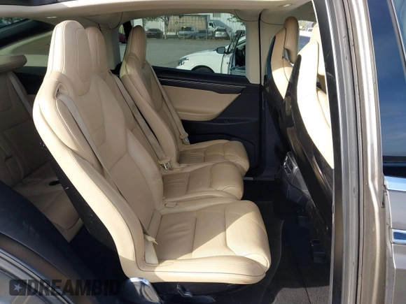 2016 Tesla Model X P90D with VIN 5YJXCAE45GF000773, listed as a IAAI auction lot 42052642 with 127,670 mi miles. Bid and sale history available at carsss.com. Image 8.