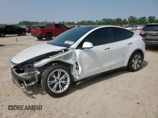 2024 Tesla Model Y Long Range с VIN 7SAYGDEE5RA261374, выставлен на аукционе Copart как лот 57666185 с пробегом 30 174 миль миль и Списание • Salvage title. История ставок и продаж доступна на DreamBid. Изображение 1.