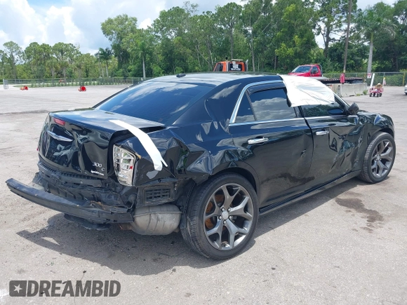 2014 Chrysler 300 C with VIN 2C3CCAKT9EH171614, listed as a IAAI auction lot 39747704 with 129,156 mi miles and . Bid and sale history available at carsss.com. Image 4.