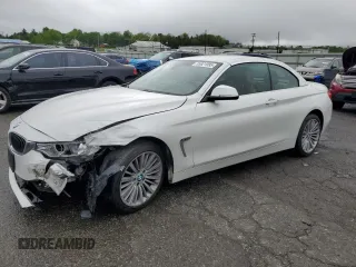 2015 BMW 4 Series 428i xDrive z VIN WBA3V9C53FP798601, wystawiony jako Copart lot #55821995 z przebiegiem 142 615 mil mil oraz Szkoda całkowita • Salvage title. Historia ofert i sprzedaży dostępna na DreamBid. Obrazek 1.