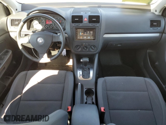 2009 Volkswagen Rabbit S with VIN WVWDA71K59W147903, listed as a Copart auction lot 76706654 with 73,297 mi miles and Salvage title. Bid and sale history available at DreamBid. Image 8.