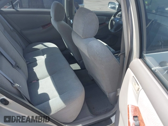 2004 Toyota Corolla CE with VIN 1NXBR32E14Z256828, listed as a IAAI auction lot 41937841 with 114,826 mi miles and . Bid and sale history available at DreamBid. Image 8.