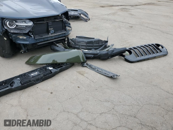2021 Jeep Gladiator Sport S с VIN 1C6JJTAM3ML554990, выставлен на аукционе Copart как лот 60881425 с пробегом 32 705 миль миль и Списание • Salvage title. История ставок и продаж доступна на DreamBid. Изображение 13.