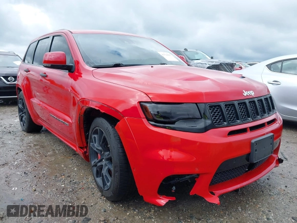 2017 Jeep Grand Cherokee SRT z VIN 1C4RJFDJXHC670370, wystawiony jako IAAI lot #41524965 z przebiegiem 87 276 mil mil oraz . Historia ofert i sprzedaży dostępna na DreamBid. Obrazek 1.