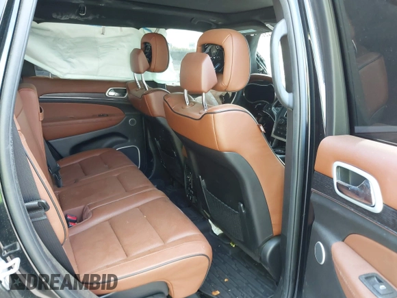 2018 Jeep Grand Cherokee Summit with VIN 1C4RJFJT5JC120523, listed as a IAAI auction lot 42136651 with 75,699 mi miles and . Bid and sale history available at DreamBid. Image 8.