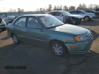 2005 Hyundai Accent GLS with VIN KMHCG45C85U588700, listed as a Copart auction lot 42792775 with 91,924 mi miles and Clean Title. Bid and sale history available at carsss.com. Image 4.