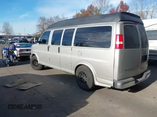 2006 GMC Savana Commercial C6Y with VIN 1GDFG15T361135454, listed as a IAAI auction lot 41400059 with 147,827 mi miles. Bid and sale history available at carsss.com. Image 3.