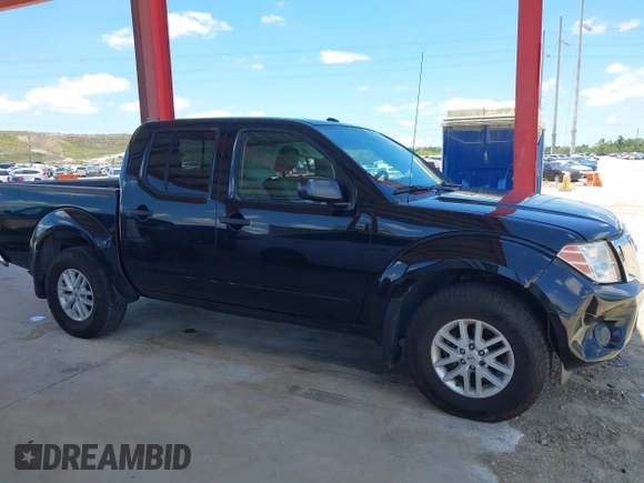 2018 Nissan Frontier SV with VIN 1N6AD0EV1JN732877, listed as a IAAI auction lot 42261667 with 139,686 mi miles and . Bid and sale history available at DreamBid. Image 13.