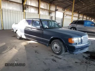 1990 Mercedes-Benz 560 with VIN WDBCA39EXLA503543, listed as a Copart auction lot 83086254 with 195,635 mi miles and Clean Title. Bid and sale history available at DreamBid. Image 4.