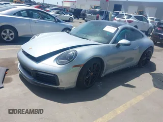 2020 Porsche 911 Carrera S z VIN WP0AB2A90LS229570, wystawiony jako IAAI lot #42242278 z przebiegiem 15 967 mil mil oraz . Historia ofert i sprzedaży dostępna na DreamBid. Obrazek 2.