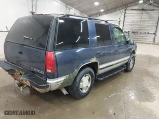 1997 Chevrolet Tahoe with VIN 1GNEK13RXVJ386600, listed as a IAAI auction lot 41917523 with 286,395 mi miles. Bid and sale history available at carsss.com. Image 4.
