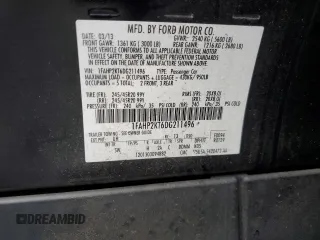 2013 Ford Taurus SHO with VIN 1FAHP2KT6DG211496, listed as a Copart auction lot 63424445 with 123,742 mi miles and Salvage title. Bid and sale history available at DreamBid. Image 12.