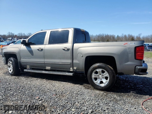 2017 Chevrolet Silverado 1500 LT with VIN 3GCUKREC0HG335785, listed as a Copart auction lot 51456305 with 104,614 mi miles and Salvage Title. Bid and sale history available at DreamBid. Image 2.