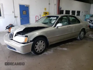 2004 Acura RL w/Navigation System z VIN JH4KA96644C004769, wystawiony jako Copart lot #59800205 z przebiegiem 172 279 mil mil oraz Szkoda całkowita • Salvage title. Historia ofert i sprzedaży dostępna na DreamBid. Obrazek 1.