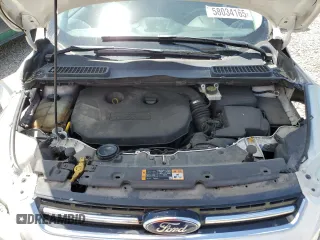 2013 Ford Escape SEL z VIN 1FMCU9H9XDUC15081, wystawiony jako Copart lot #58034165 z przebiegiem 166 612 mil mil oraz Szkoda całkowita • Salvage title. Historia ofert i sprzedaży dostępna na DreamBid. Obrazek 11.