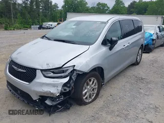 2024 Chrysler Pacifica Touring L with VIN 2C4RC1BG8RR139066, listed as a IAAI auction lot 42150531 with 18,777 mi miles and . Bid and sale history available at DreamBid. Image 2.