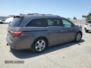 2012 Honda Odyssey Touring с VIN 5FNRL5H9XCB109229, выставлен на аукционе Copart как лот 59885895 с пробегом 153 668 миль миль и Чистый • Clean title. История ставок и продаж доступна на DreamBid. Изображение 3.