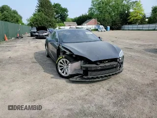 2018 Tesla Model S 75D with VIN 5YJSA1E20JF283959, listed as a Copart auction lot 59386465 with 75,078 mi miles and Salvage title. Bid and sale history available at DreamBid. Image 14.