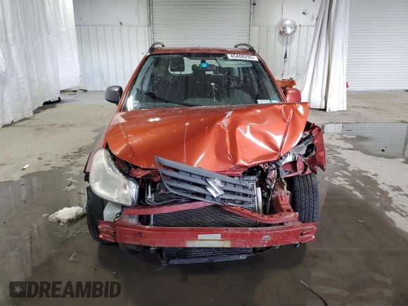 2013 Suzuki SX4 Crossover z VIN JS2YB5A3XD6101784, wystawiony jako Copart lot #45408295 z przebiegiem Nie podano mil oraz Szkoda całkowita • Salvage title. Historia ofert i sprzedaży dostępna na DreamBid. Obrazek 5.