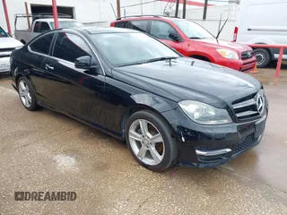 2015 Mercedes-Benz C-Class C 250 with VIN WDDGJ4HBXFG383850, listed as a IAAI auction lot 41809724 with 100,032 mi miles. Bid and sale history available at carsss.com. Image 1.