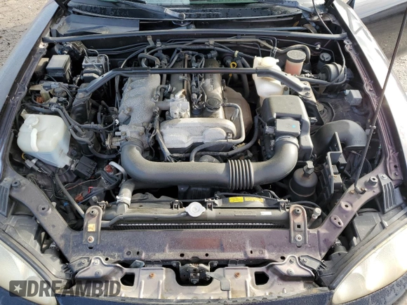 2004 Mazda MX-5 Miata LS with VIN JM1NB353140408906, listed as a Copart auction lot 56664715 with 86,603 mi miles and Salvage title. Bid and sale history available at DreamBid. Image 11.
