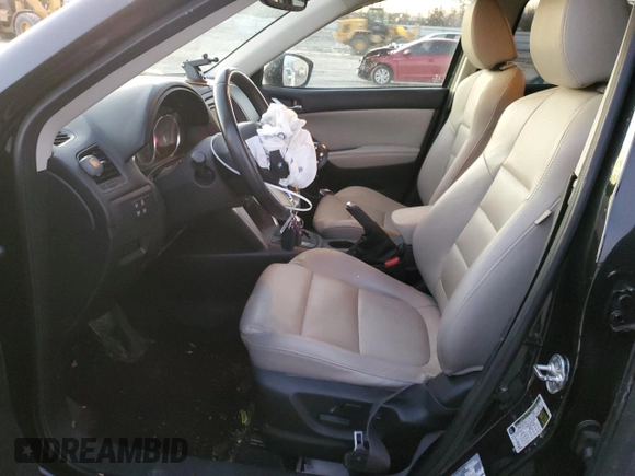 2014 Mazda CX-5 Grand Touring with VIN JM3KE4DY9E0366667, listed as a Copart auction lot 88707365 with 140,115 mi miles and Salvage Title. Bid and sale history available at carsss.com. Image 7.