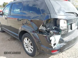 2013 Dodge Journey SXT with VIN 3C4PDDBG7DT553130, listed as a IAAI auction lot 40570369 with Not Provided miles and . Bid and sale history available at DreamBid. Image 6.
