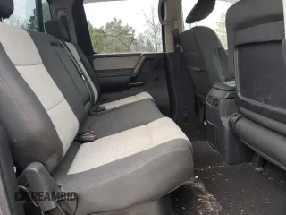 2010 Nissan Titan LE with VIN 1N6BA0ECXAN310425, listed as a Copart auction lot 88897755 with 132,467 mi miles and Salvage Title. Bid and sale history available at carsss.com. Image 10.