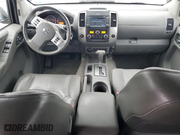 2014 Nissan Frontier SL z VIN 1N6AD0FV2EN720242, wystawiony jako Copart lot #86976214 z przebiegiem 118 581 mil mil oraz Szkoda całkowita • Salvage title. Historia ofert i sprzedaży dostępna na DreamBid. Obrazek 8.