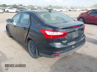 2012 Ford Focus SE with VIN 1FAHP3F24CL381806, listed as a IAAI auction lot 42058773 with Not Provided miles and . Bid and sale history available at DreamBid. Image 3.