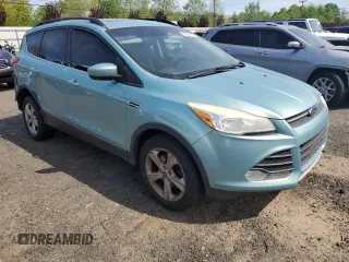 2013 Ford Escape SE with VIN 1FMCU9G93DUA76607, listed as a Copart auction lot 56309755 with 265,232 mi miles and Salvage title. Bid and sale history available at DreamBid. Image 4.