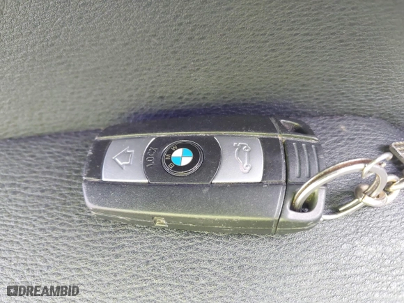 2014 BMW X1 xDrive28i with VIN WBAVL1C58EVY24491, listed as a IAAI auction lot 42022672 with 115,123 mi miles. Bid and sale history available at carsss.com. Image 11.