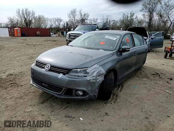 2014 Volkswagen Jetta SEL z VIN 3VWL17AJ9EM441590, wystawiony jako Copart lot #50995785 z przebiegiem Nie podano mil oraz Szkoda całkowita • Salvage title. Historia ofert i sprzedaży dostępna na DreamBid. Obrazek 10.