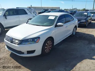 2015 Volkswagen Passat 1.8T Limited Edition with VIN 1VWAT7A38FC043258, listed as a IAAI auction lot 41433514 with 111,169 mi miles. Bid and sale history available at carsss.com. Image 2.